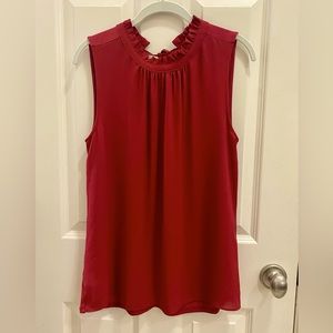 LOFT sleeveless blouse with high ruffle neck & tie neck in the back.Size Med